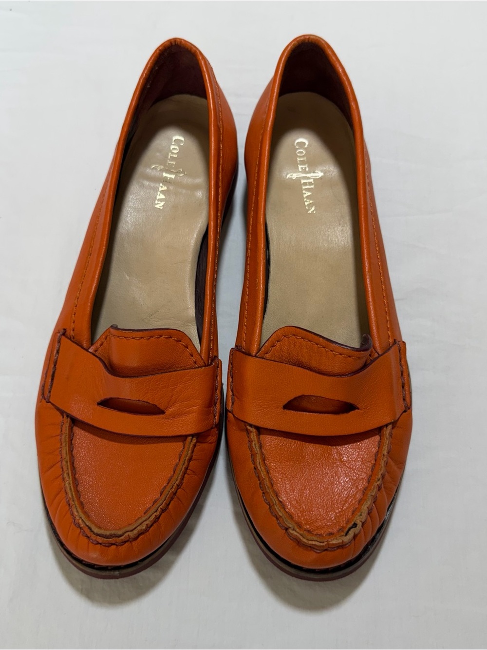 Cole Haan Women's Bright Orange Leather Penny Loafers with Nike Air soles